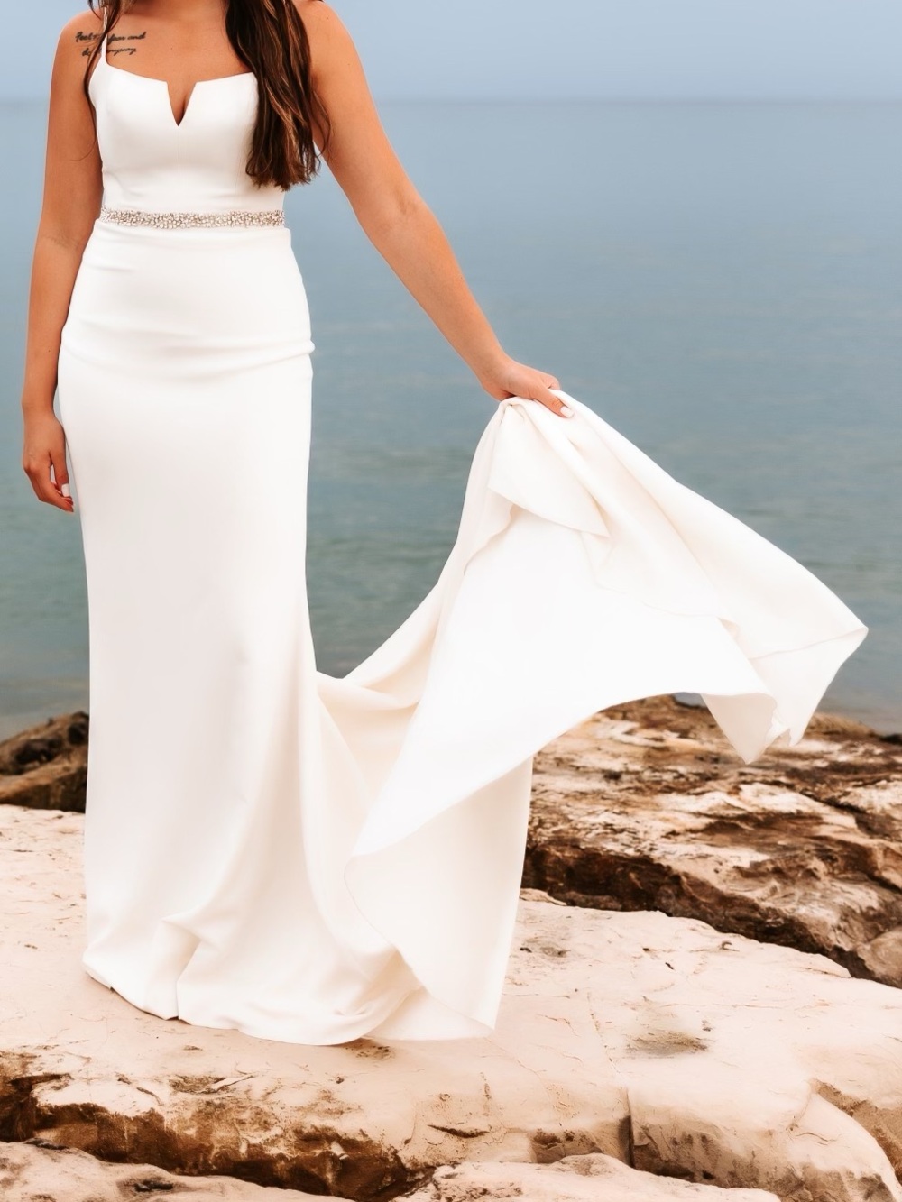 Elegant White V-Neck Wedding Gown with Beaded Waist